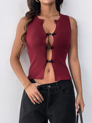 Burgundy ribbed knit crop top with button-up front and cut-out detail.