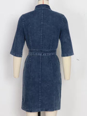 Blue denim shirt dress with zipper front, belt, and short sleeves.