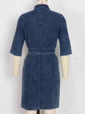 Blue denim shirt dress with zipper front, belt, and short sleeves.