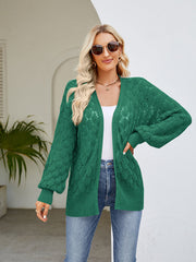 Mid Green open-knit cardigan with balloon sleeves and diamond pattern.