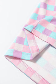 Pastel checkered pajama set detail showing hem and stitching