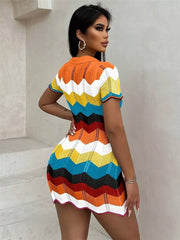 Zigzag knit short sleeve sweater dress in multi-color with a collared neckline.