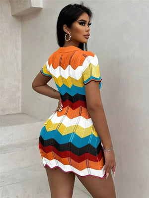 Zigzag knit short sleeve sweater dress in multi-color with a collared neckline.