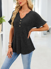Black ribbed knit short sleeve t-shirt with V-neck and decorative buttons.