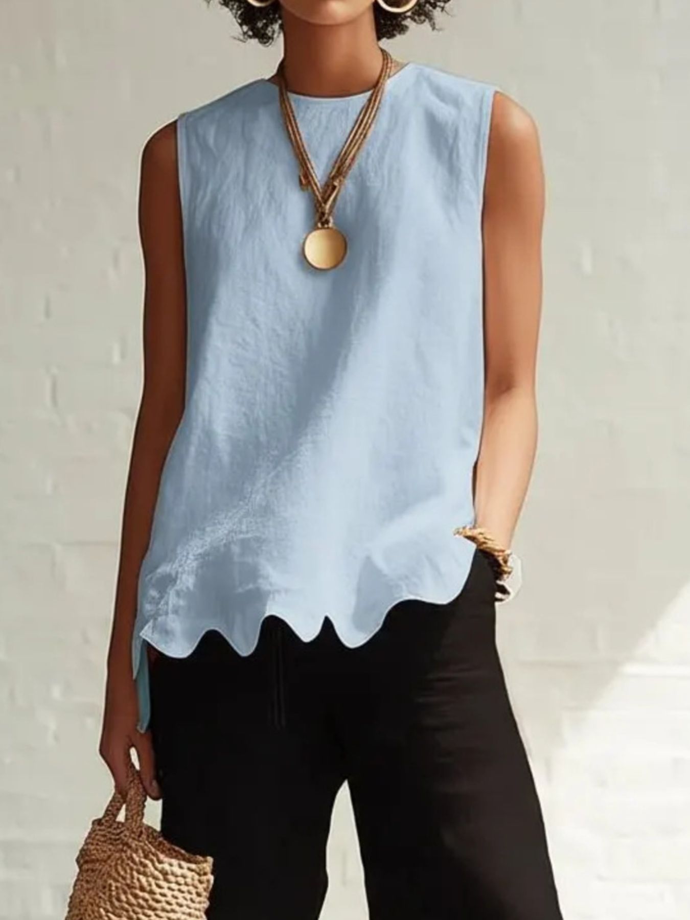 Sky blue sleeveless tank top with scalloped hem detail
