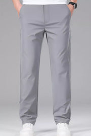 Men's gray slim-fit stretch dress pants with a clean, modern cut.