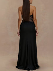 Black lace trim halter neck maxi dress with a flowing skirt.