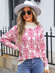 Geometric floral knit turtleneck pullover in cream with pink pattern.