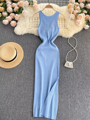 Light blue ribbed knit bodycon midi dress with a scoop neck and side slit.