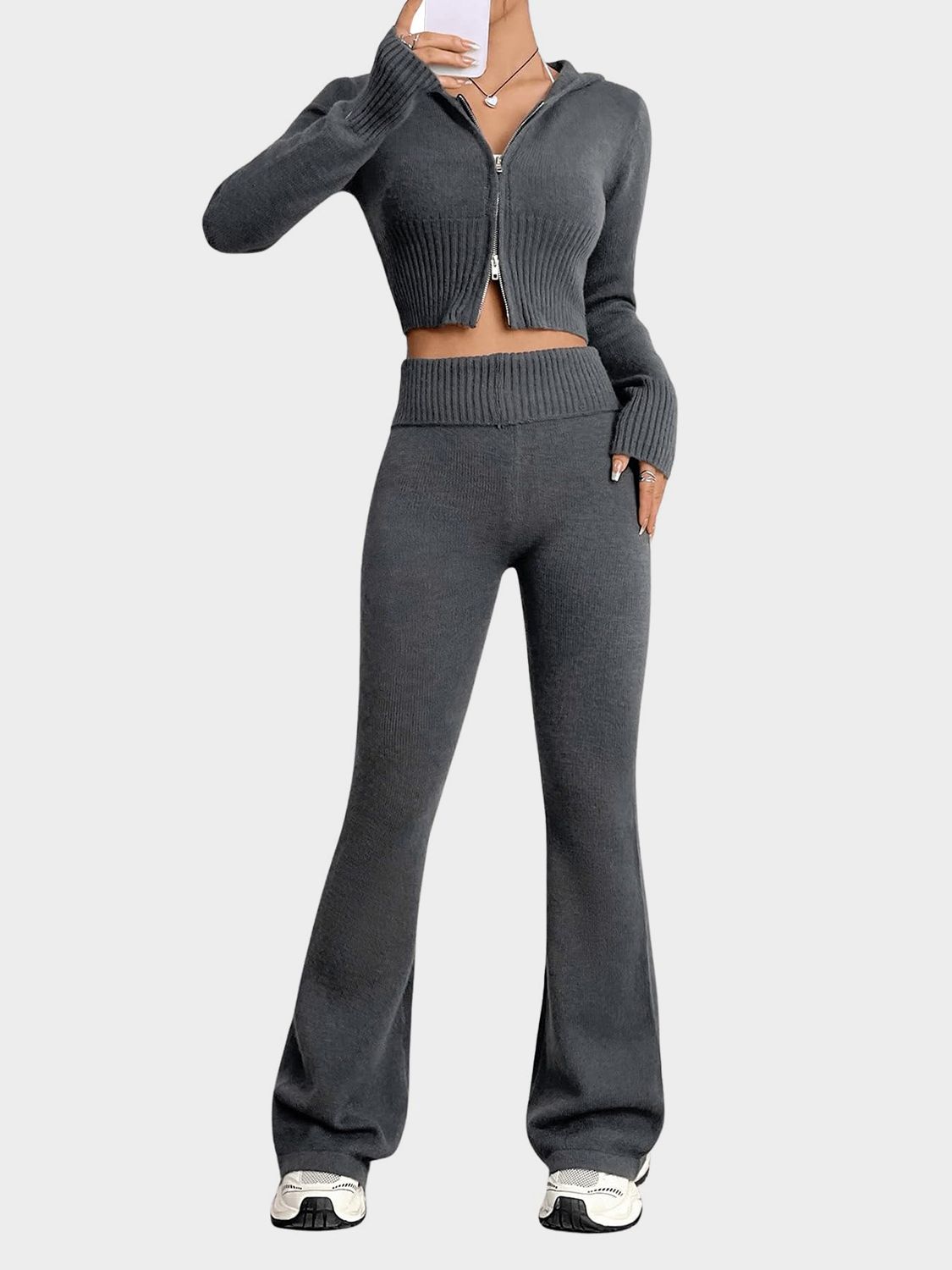 Dark gray ribbed knit flare set with cropped zip-up hoodie and high-waisted flared pants.