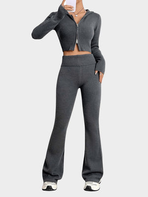 Dark gray ribbed knit flare set with cropped zip-up hoodie and high-waisted flared pants.