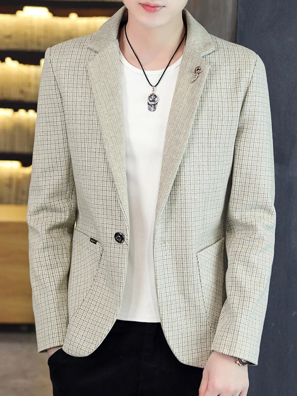 Men's light brown micro-plaid slim fit blazer with a single button closure and notched lapels.