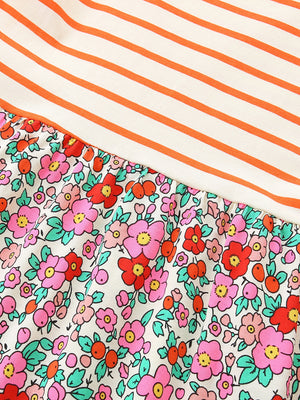 Baby dress with orange stripes and a floral print skirt