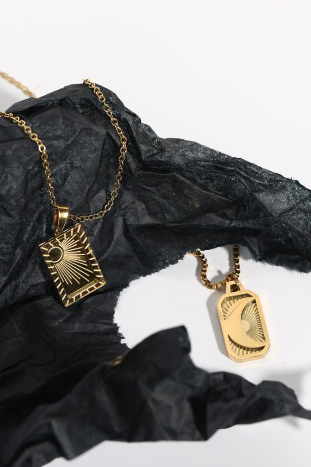18K gold-plated necklaces with sun and moon celestial charms.