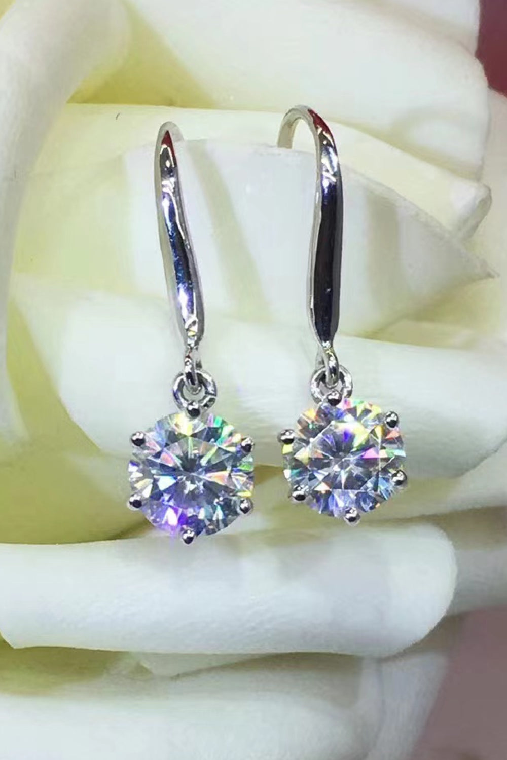 Silver drop earrings with clear cubic zirconia solitaire gems