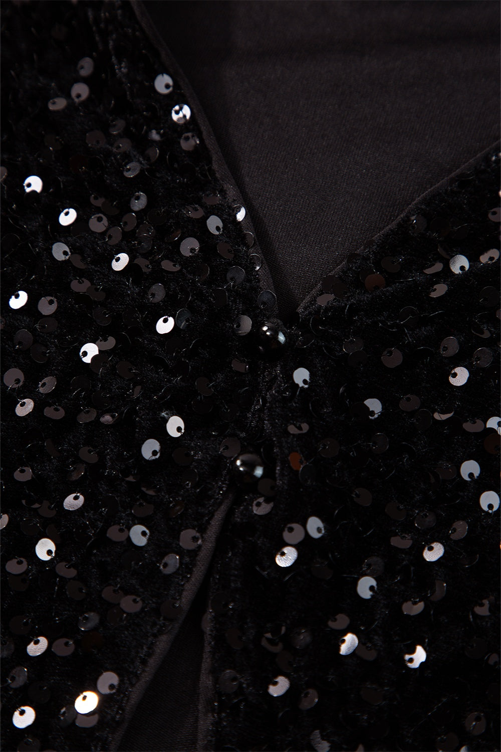 Black sequin backless blouse with pearl button detail