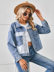 Denim trucker jacket with python pattern panels and distressed details.
