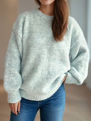 Light green oversized crewneck sweater with textured knit and ribbed cuffs and hem.