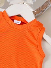 Orange ribbed cotton baby tank top with a size tag.