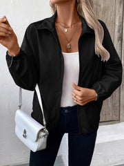 Black nylon bomber jacket with zippered front and elastic drawstring hem.
