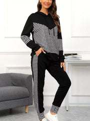 Black houndstooth hoodie and pants set with drawstring and contrast panels.