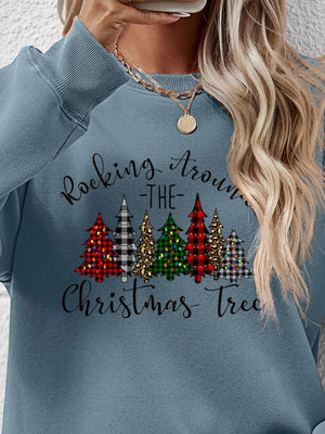 Misty Blue crewneck sweatshirt with a graphic Christmas tree pattern and text.