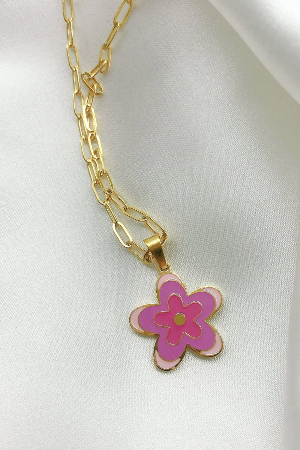Enamel floral pendant chain necklace with gold-plated paperclip chain, featuring a pink and blush flower charm.