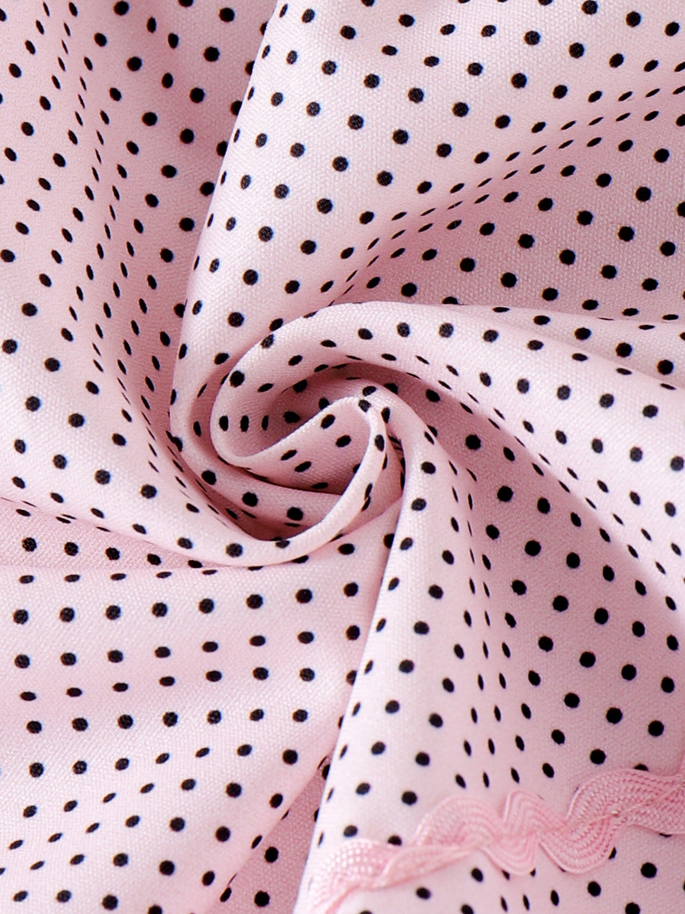 Pink polka dot baby dress with lace trim detail