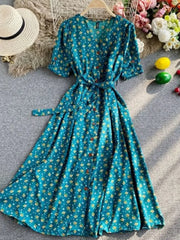 Turquoise floral v-neck midi dress with button front and belted waist