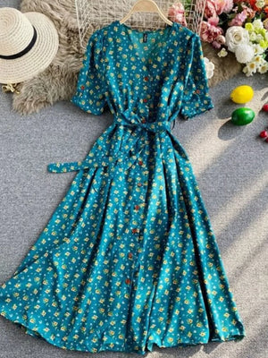 Turquoise floral v-neck midi dress with button front and belted waist