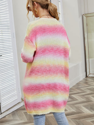 Rainbow gradient knit cardigan with pink, yellow, and white stripes.