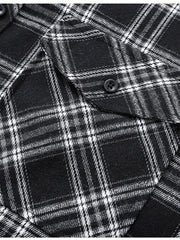Men's black and white plaid button-up shirt with chest pocket detail.