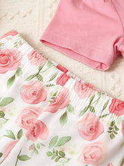 Pink ruffle top and white floral pants set for baby girls.