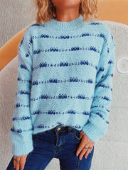 Pastel blue crew neck sweater with textured blue stripes and fuzzy acrylic knit.