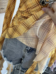 Yellow plaid asymmetrical ruffle hem maternity overshirt with ruched detail.