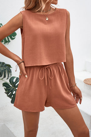 Textured crop top and shorts set in rust with adjustable drawstring shorts.