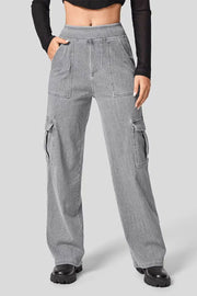 Gray denim wide-leg cargo pants with utility pockets and a casual fit.