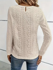 White eyelet embroidered blouse with lace yoke detail and keyhole back.