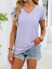 Lavender eyelet v-neck tee with petal cap sleeves and textured pattern.