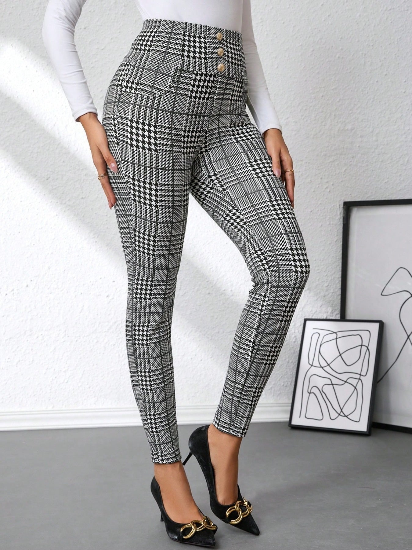 Plaid high waist slim fit ankle length pants with decorative buttons.