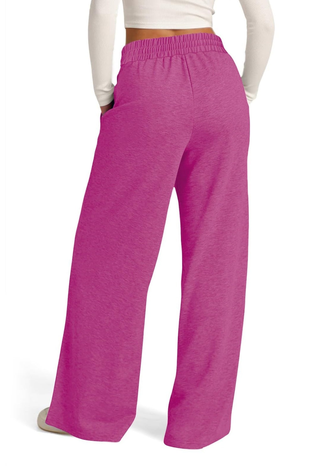 Seamed palazzo lounge trousers in fuchsia pink with elastic waist and pockets.