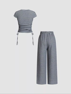 Striped crop top with drawstring sides and wide-leg pants set in navy blue.