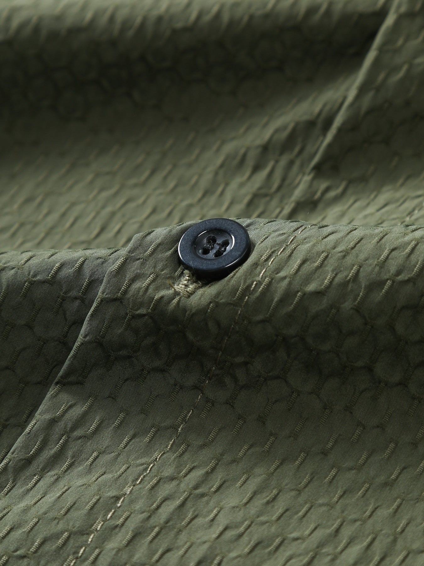 Army green cotton casual shirt with textured pattern and button detail