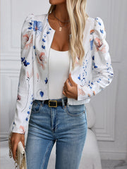 White floral puff sleeve cropped zip jacket with a round neckline