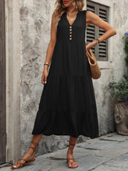 Black tiered midi sundress with V-neck and button detail.