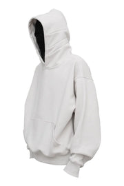 Light gray oversized slouch hoodie with kangaroo pocket and black lining.