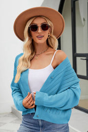 Sky blue textured stitch cropped V-neck cardigan with button front and ribbed cuffs.