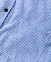 Light blue button-down shirt with white pinstripes and a chest pocket.