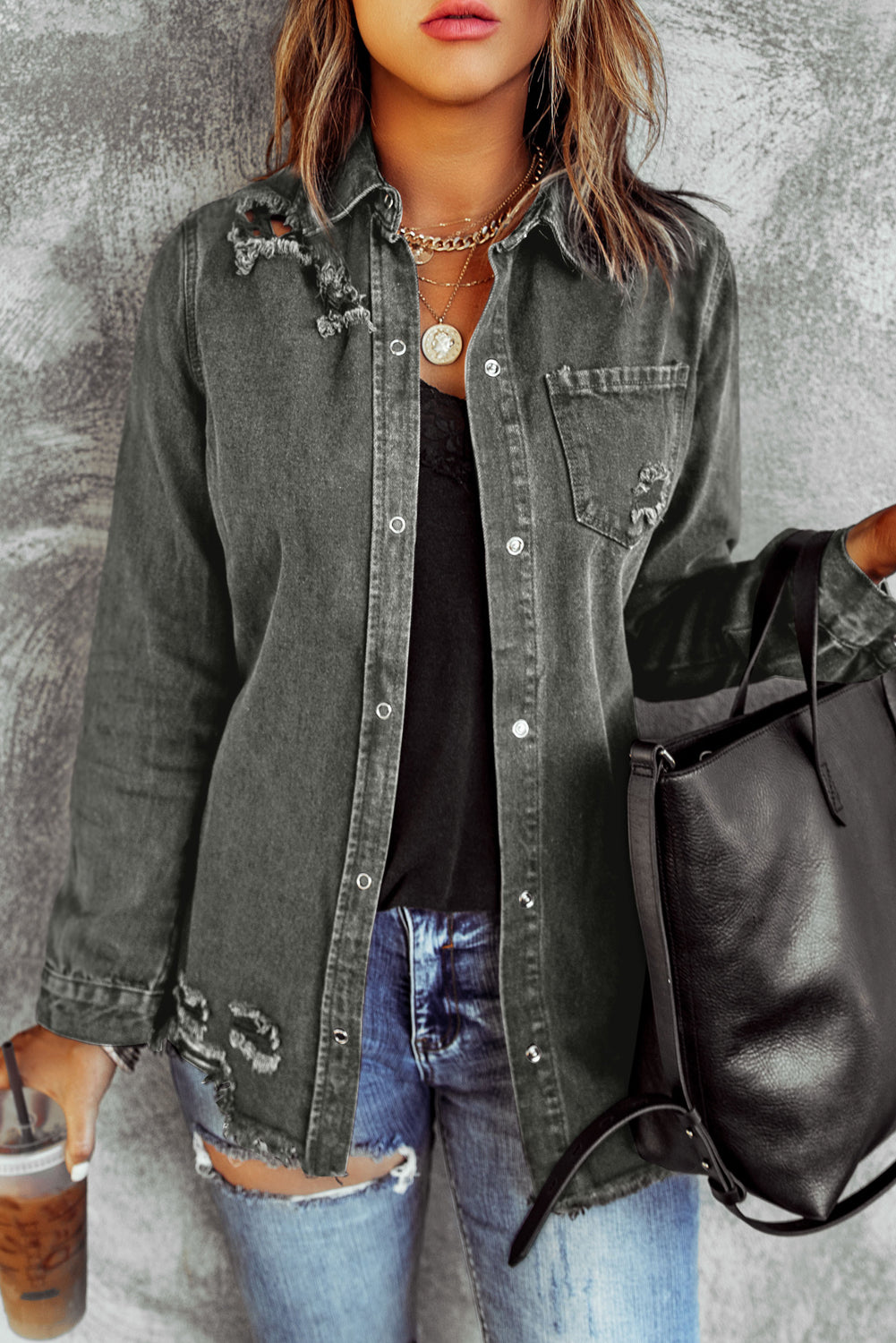 Dark Gray distressed denim shirt jacket with raw edges and button front.