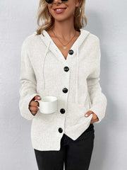 White button-front hooded knit cardigan with drawstring and black buttons.